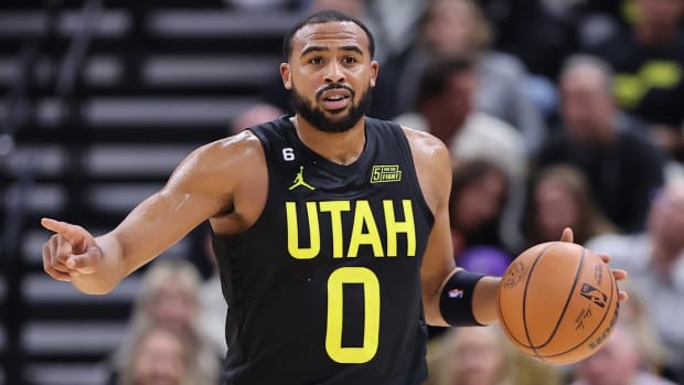 Utah Jazz guard Talen Horton-Tucker (0) brings the ball up the court against the Houston Rockets in the third quarter at Vivint Arena.